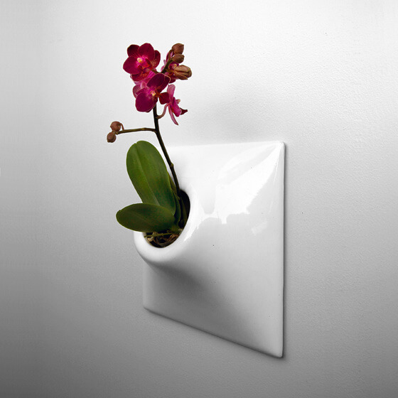 white ceramic wall planter